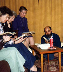 A secular institute group at prayer
